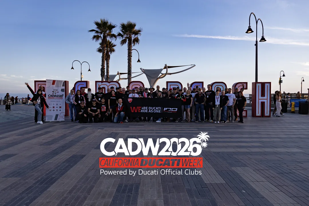 The CADW 2026 group gathered at the Pismo Beach sign, with the event logo below.