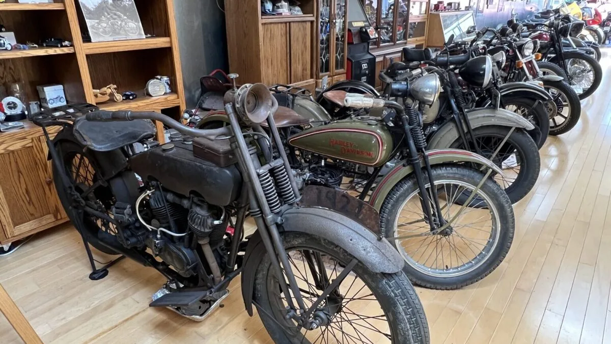 Rows of vintage motorcycles on display inside Jameson's Classic Motorcycle Museum